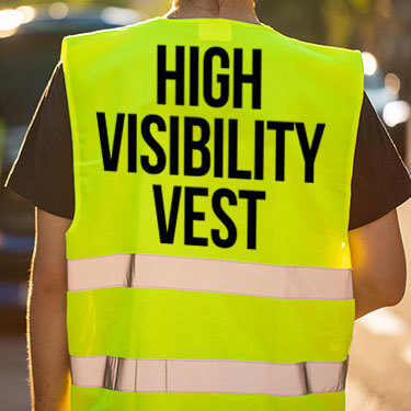 A person in a yellow safety vest
